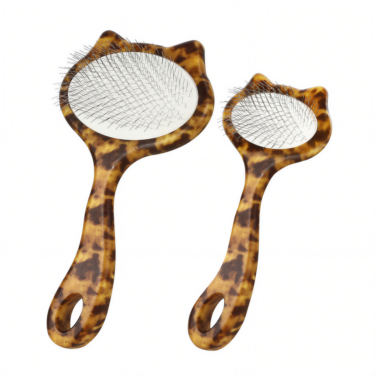 Large and small leopard-print slicker brushes showing their metal pin surfaces on a white background.