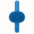 Blue 2-in-1 Cat Self-Grooming Brush on a clean warm-white background
