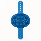 Blue 2-in-1 Cat Self-Grooming Brush on a clean warm-white background