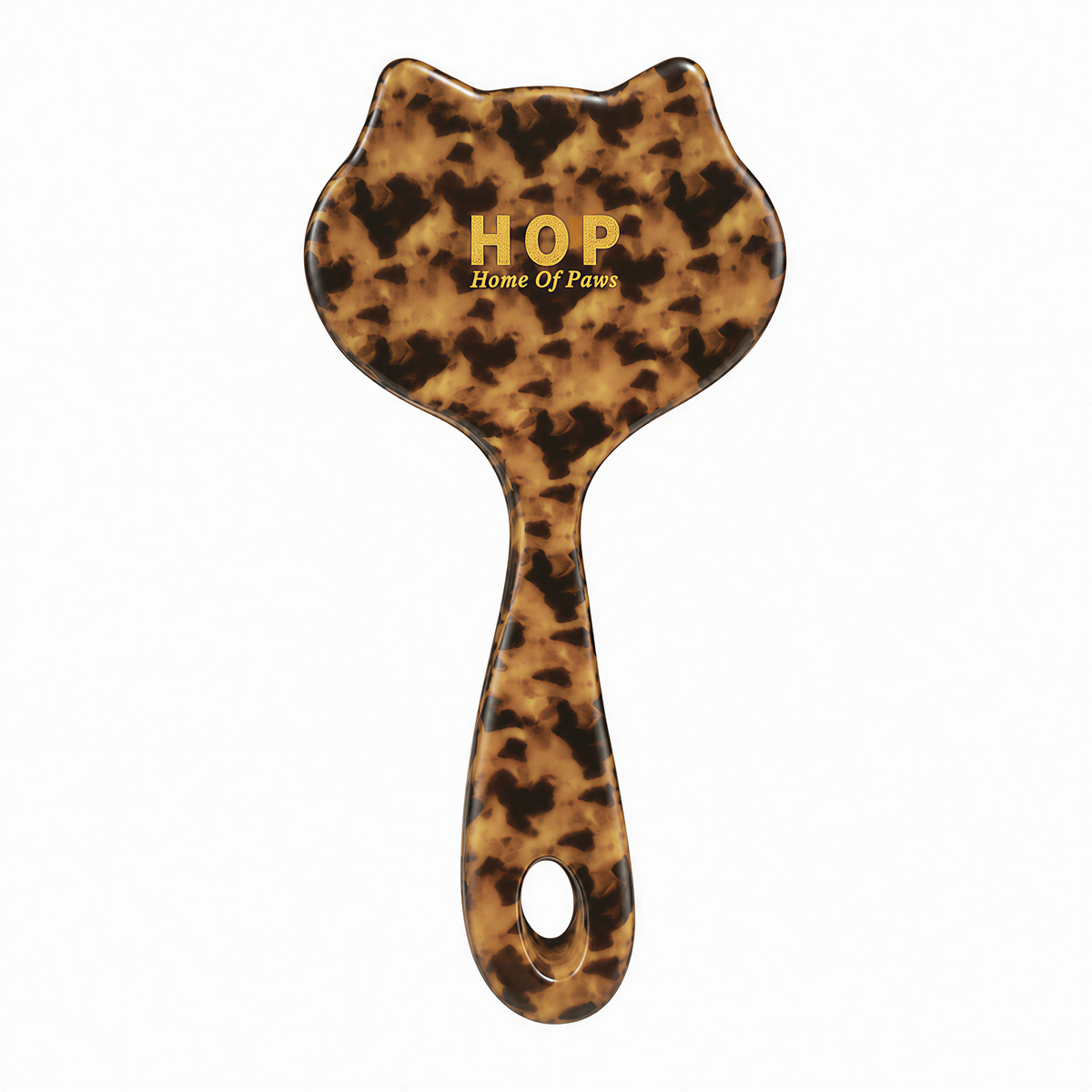 Back of a leopard-print cat-shaped HOP slicker brush with gold lettering and a hanging hole.