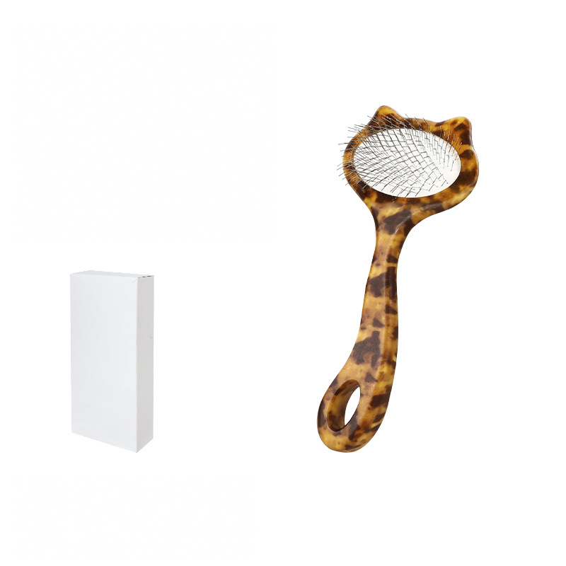 Small HOP leopard-print cat-shaped slicker brush with its white retail box
