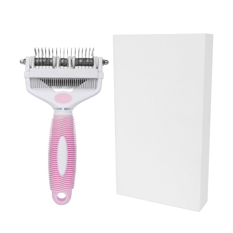 White and pink pet grooming comb beside a plain white retail box