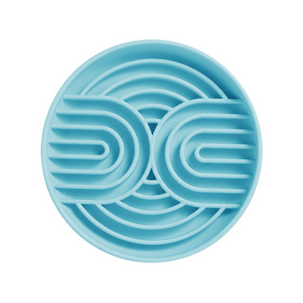 One blue silicone slow feeder bowl with curved channels on a white background
