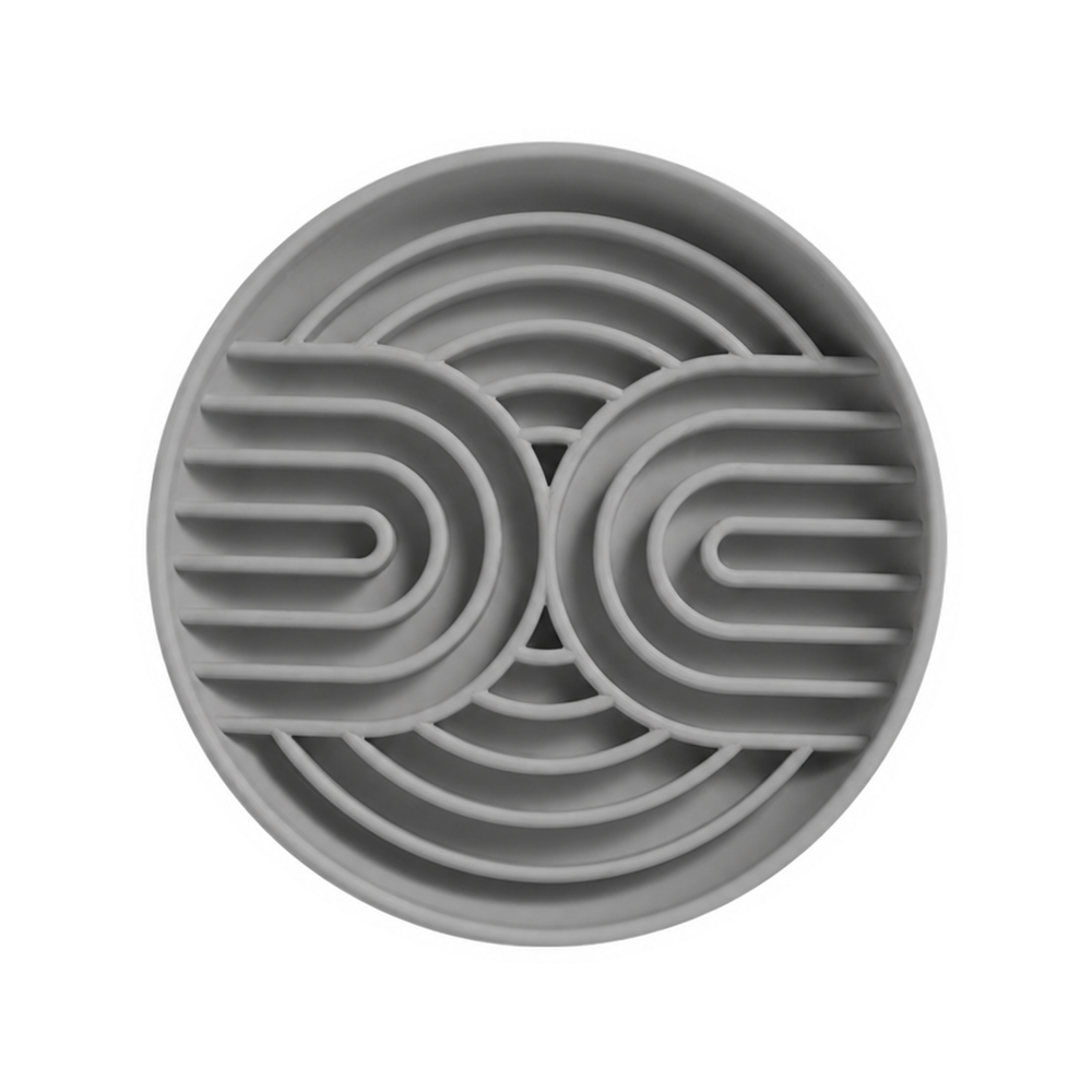 One gray silicone slow feeder bowl with curved channels on a white background