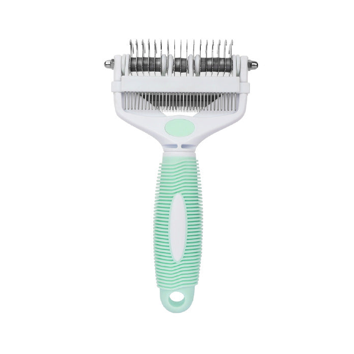 One white and green 3-in-1 pet grooming comb on a white background