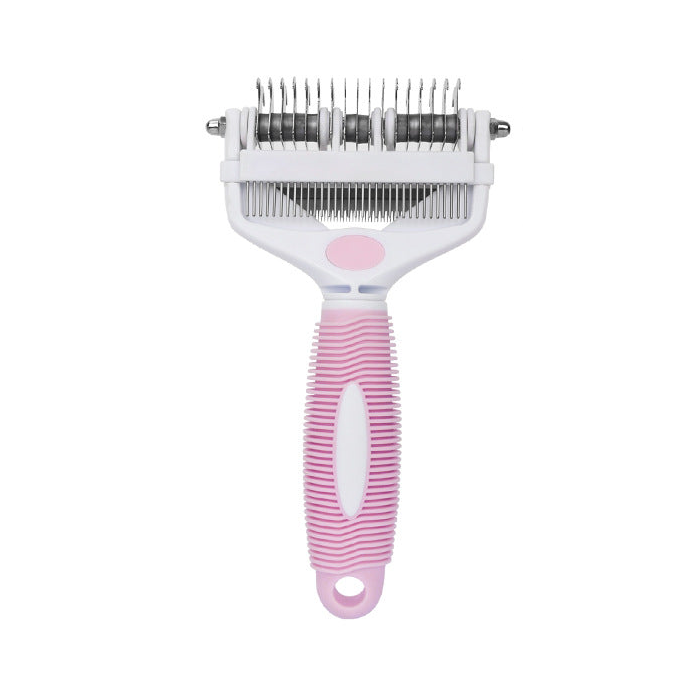 One white and pink 3-in-1 pet grooming comb on a white background
