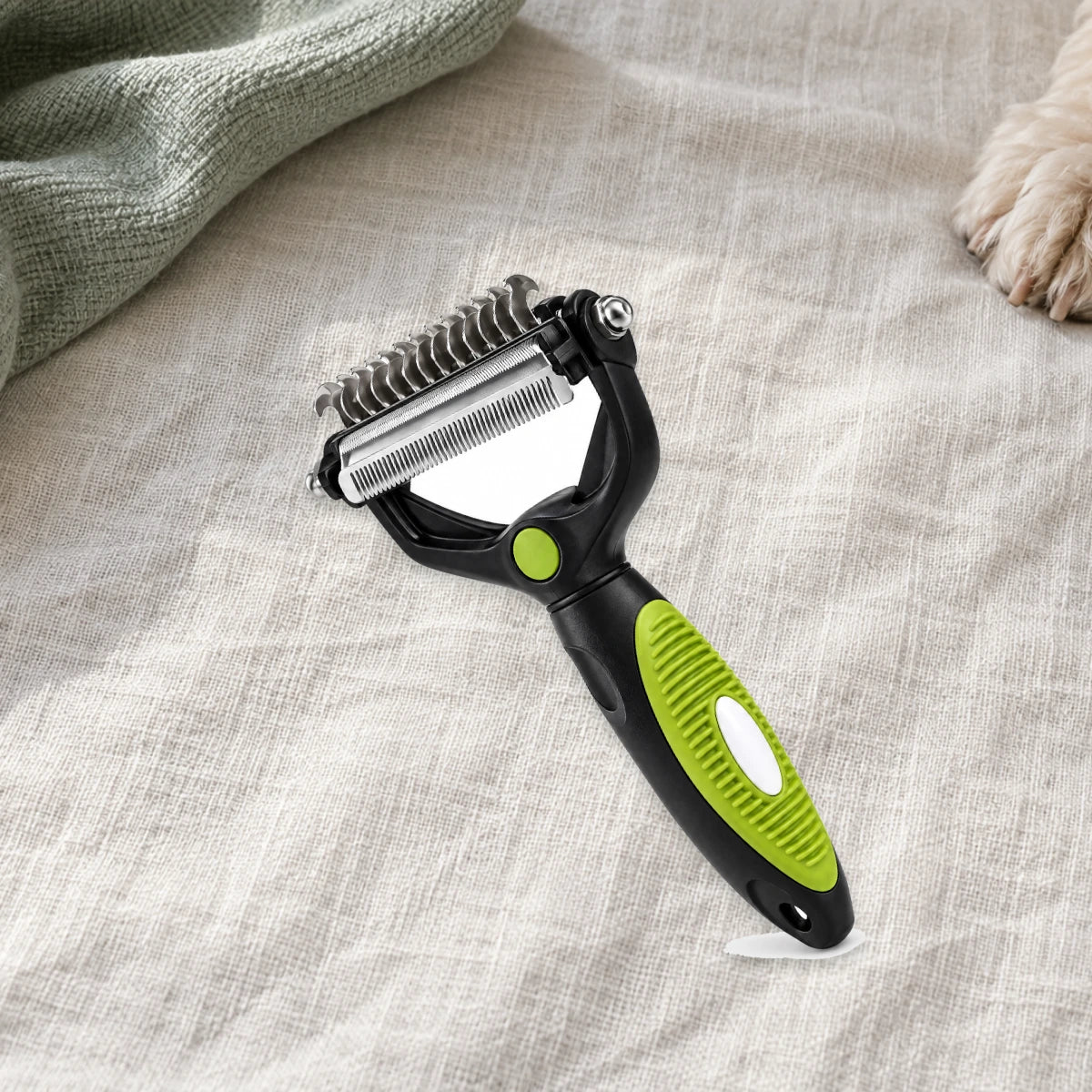 A black and lime green grooming comb on ivory linen
